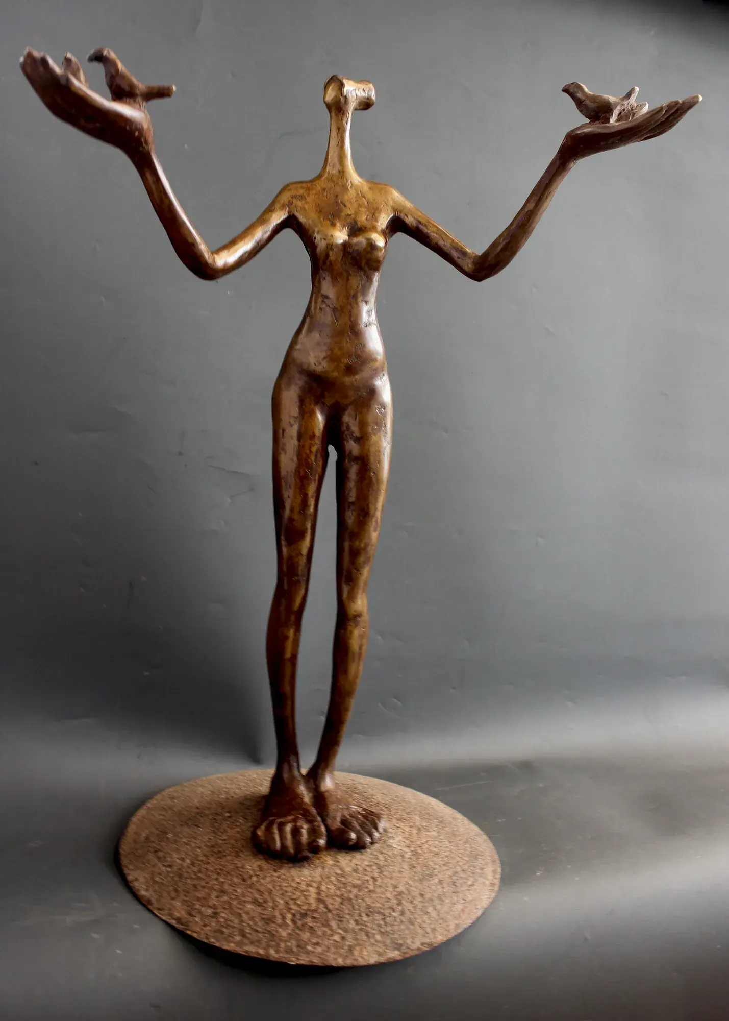 Kalpavruksha, alternate angle — the woman's figure-eight torso rising into gnarled bronze branches