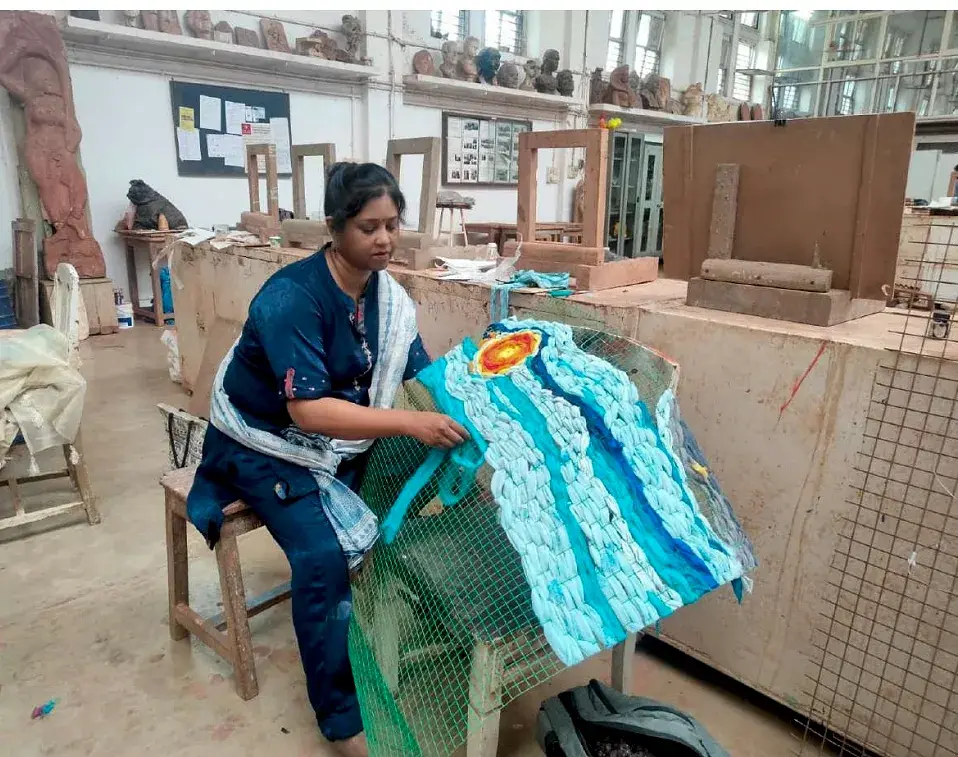 Living Tapestry in progress — the artist constructing the textile wall hanging in her studio